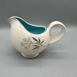 Elegant Cream and Teal Floral Ceramic Pitcher